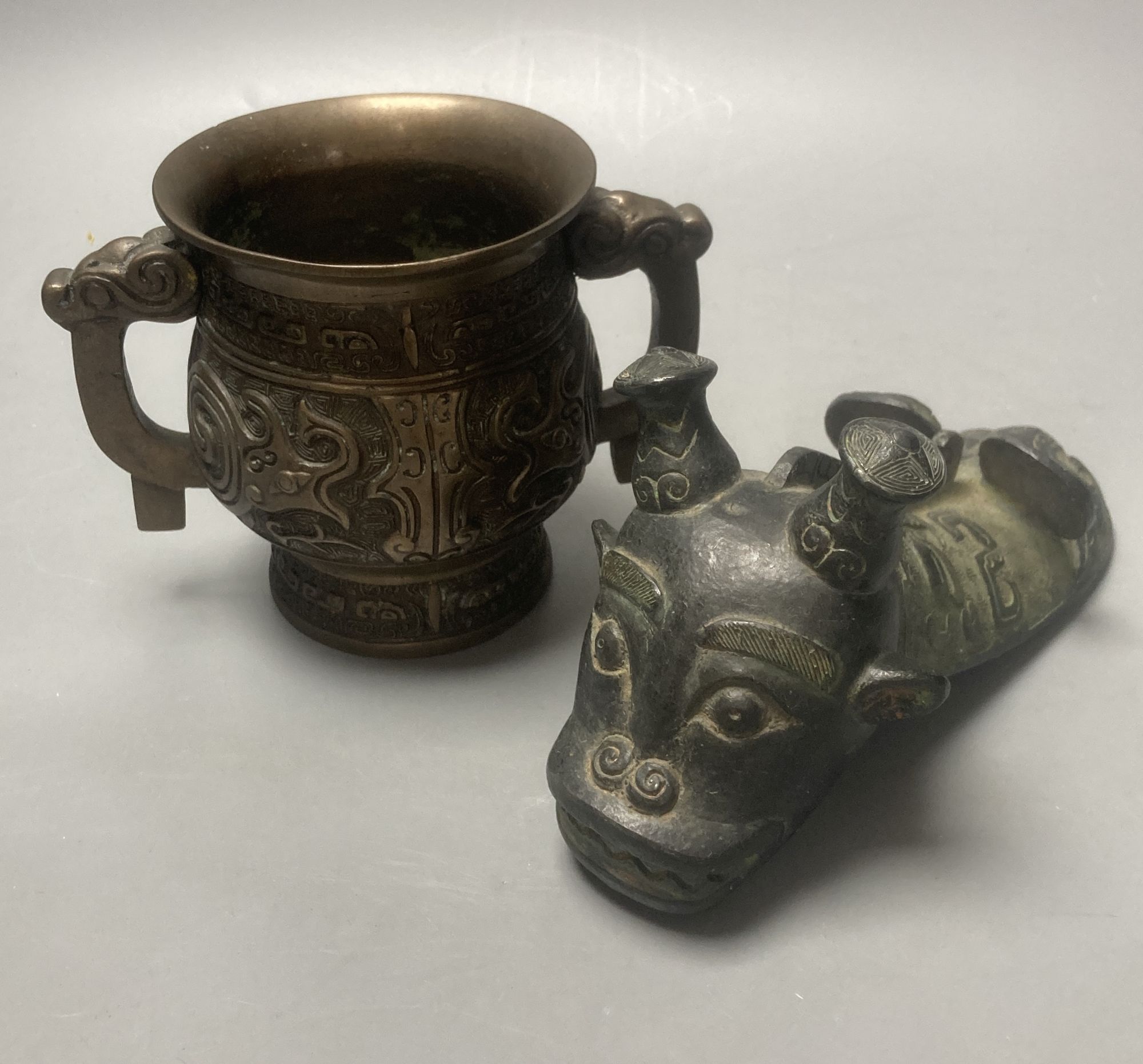 Two Chinese bronze censers, height 11cm and a beast